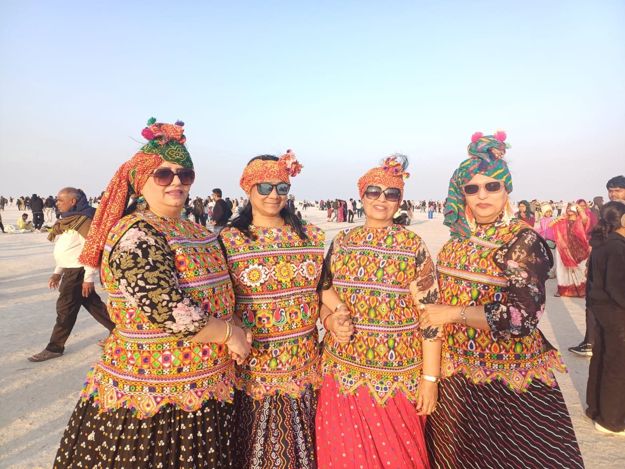 Guests in traditional Kutchi chaniya choli on the White Rann salt flats